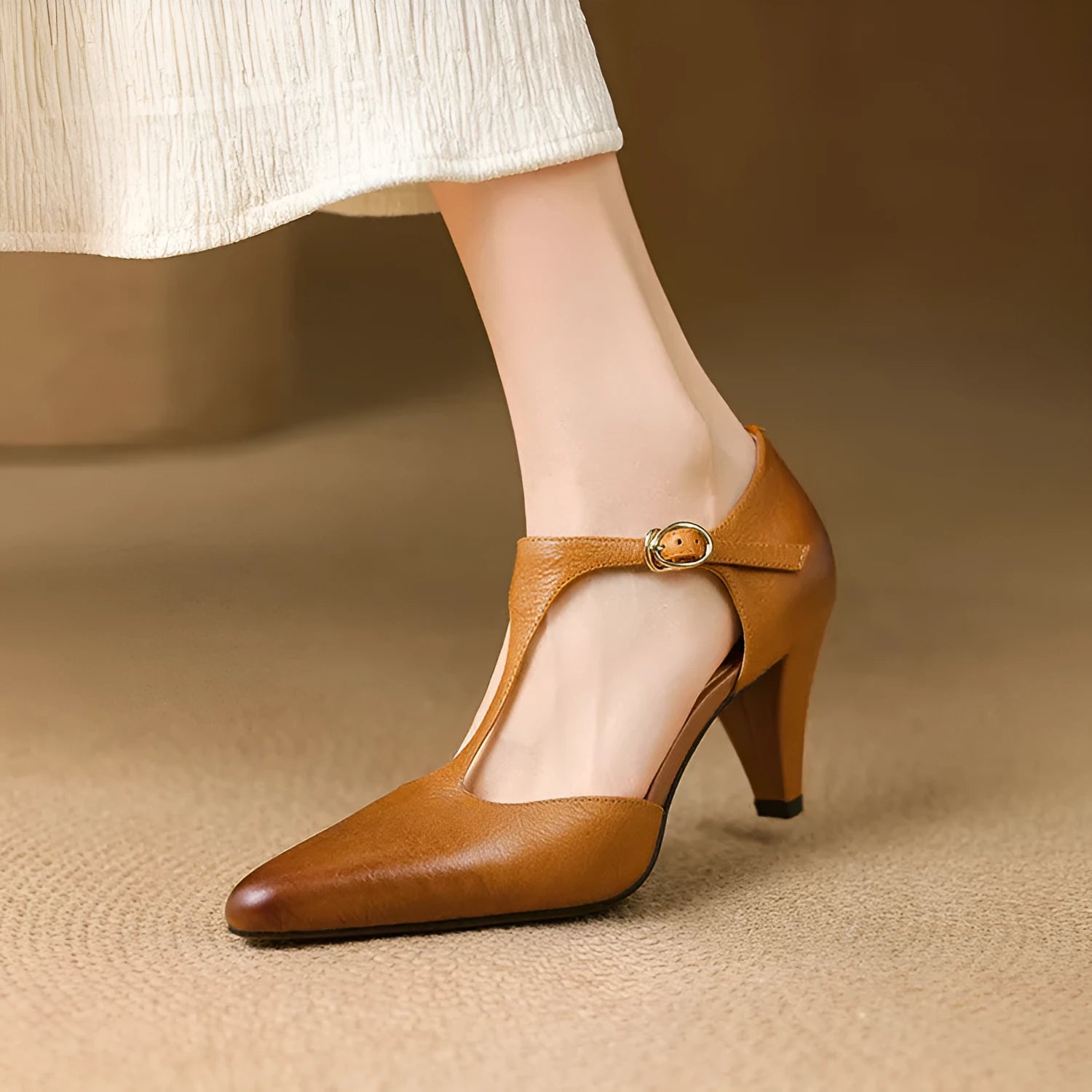 Brown retro women's T-strap closed toe sandals with a buckle and short block heel.