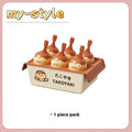 Octopus balls ice cream mould made from white plastic with multiple spherical cavities for homemade frozen desserts