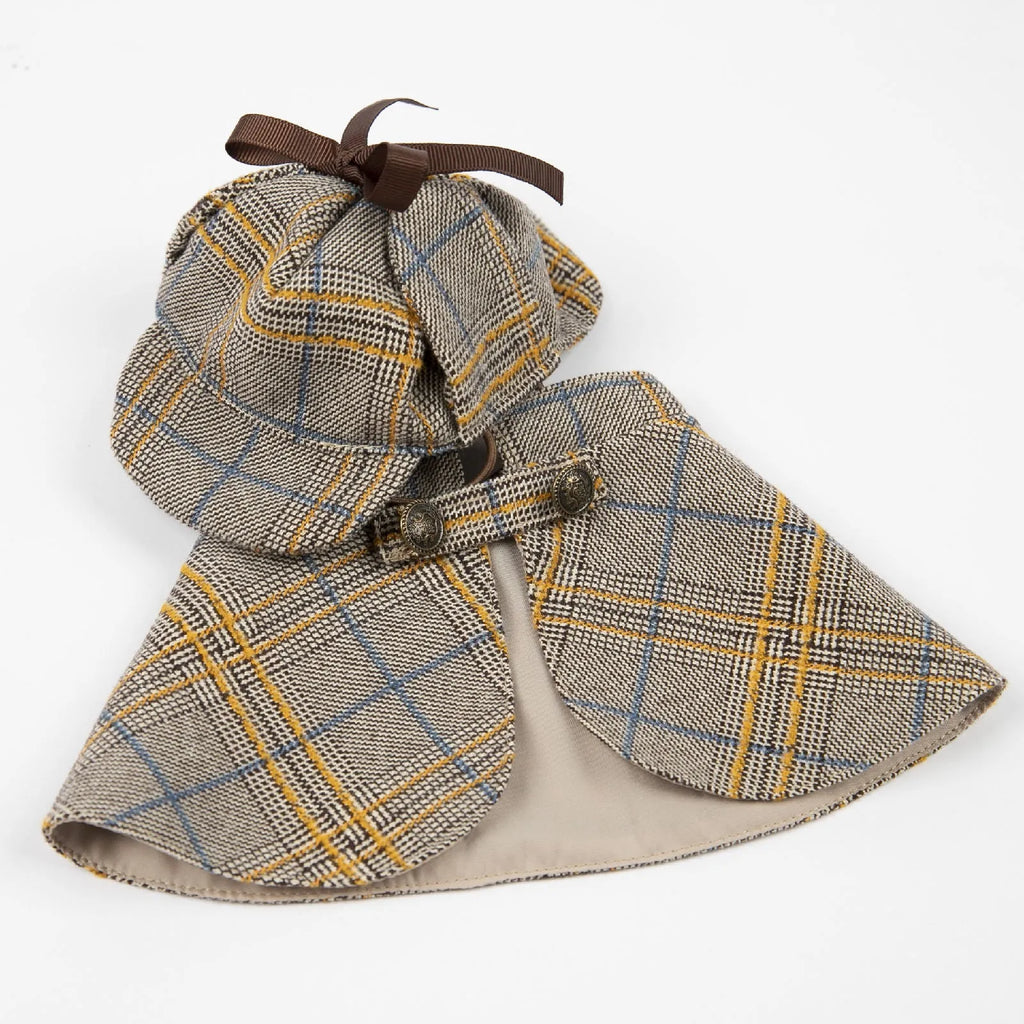 Camel coloured cotton pet cloak with adjustable hat showing six size options for dogs