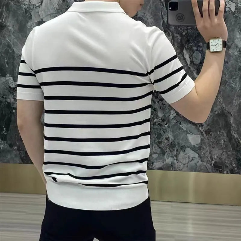 Man wearing a black and white striped knitted t-shirt with a lapel collar