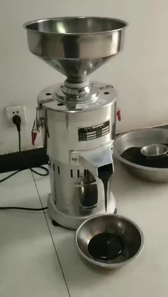 Small stainless steel electric sesame paste grinding machine with a 100mm wheel for home use.