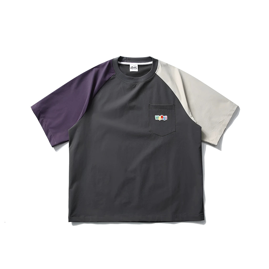Dark grey loose fit t-shirt with contrast colour raglan short sleeves.