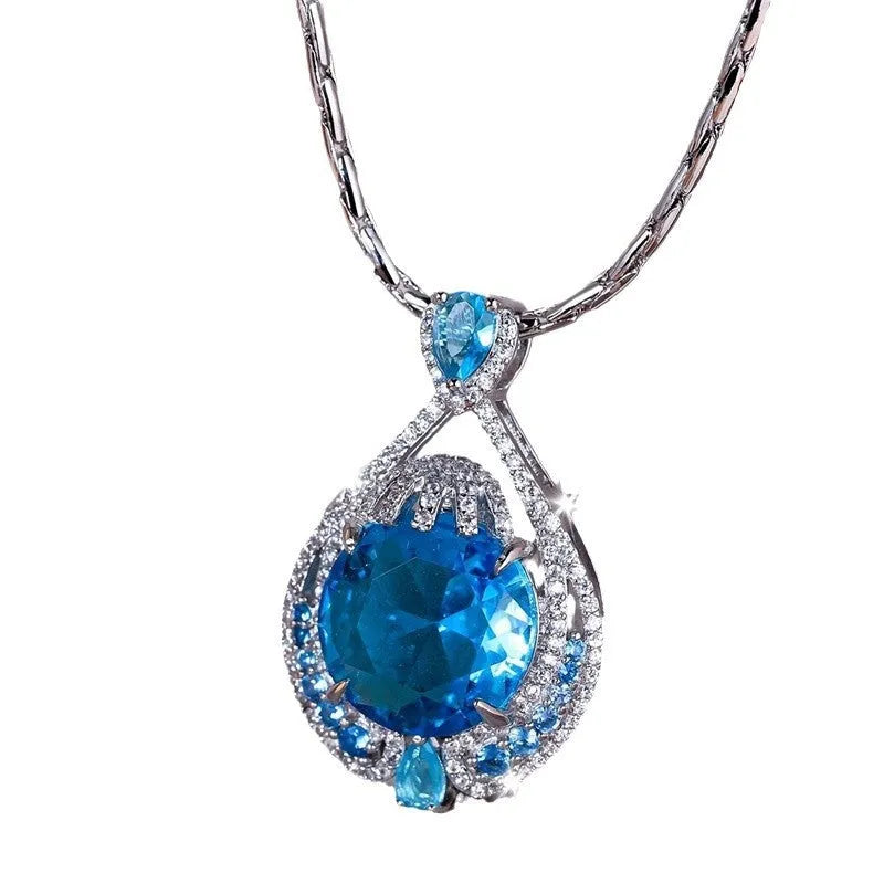 Blue geometric crystal pendant necklace with fireworks cut on a water wave chain for women
