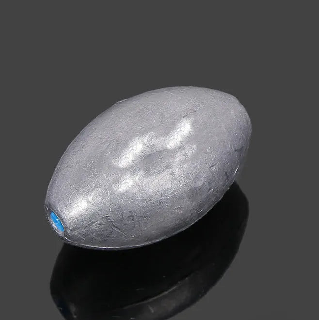 Sea fishing sinker with scale markings and plastic core olive lead in rugby shape
