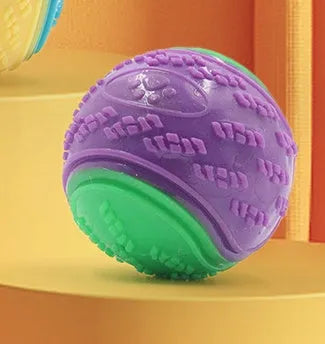 Red and blue TPR rubber dog training ball with squeaker, 6.5cm in diameter