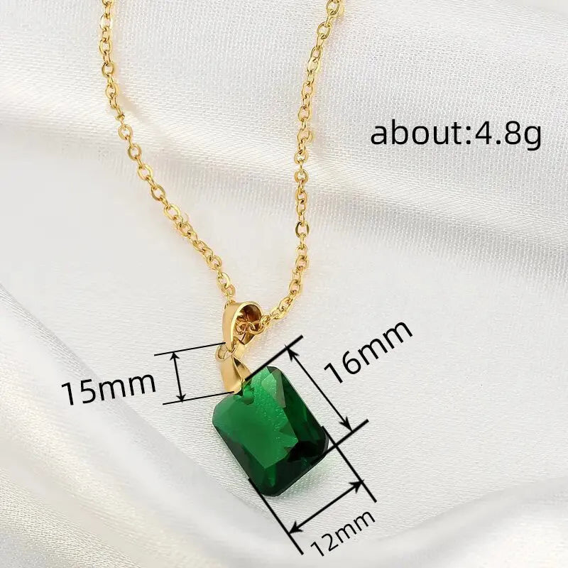 Rectangular green copper geometric pendant necklace on an O-ring chain.