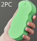 White 3D fish scale pattern bath sponge ball for gentle exfoliation in the shower.