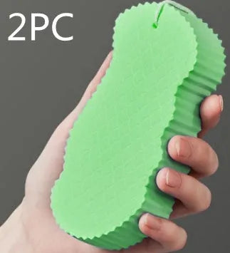 White 3D fish scale pattern bath sponge ball for gentle exfoliation in the shower.