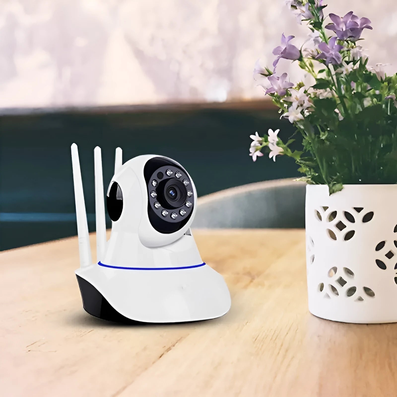 White dome-style wireless security camera with a 3.6mm lens for indoor and outdoor HD surveillance.