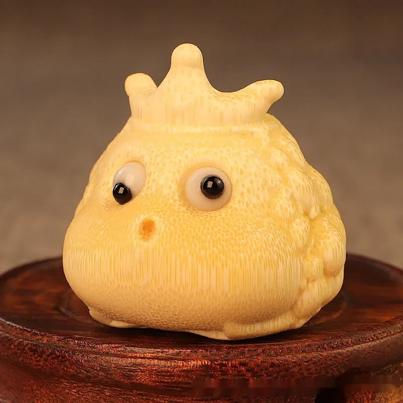 Solid bamboo carving of a cute Crown Princess toad ornament with 5.0 live eye detail.