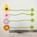 Hand-crocheted wool bookmark with daisy design on flexible wire in multiple colour options