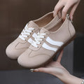 Women's vintage-style canvas sneakers with a soft rubber sole in dark red, maroon, and khaki colour options.
