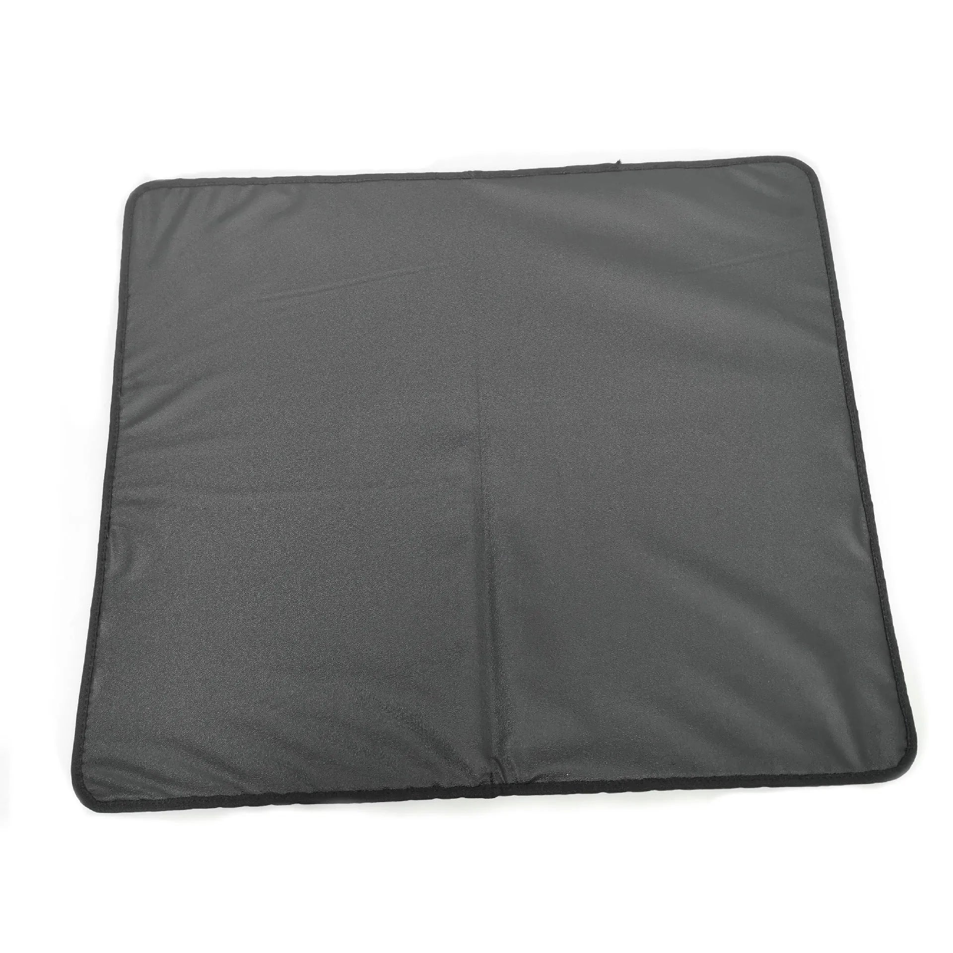 Double-layer EVA cat litter mat in black with honeycomb texture, 1.5cm thick, placed under a litter tray