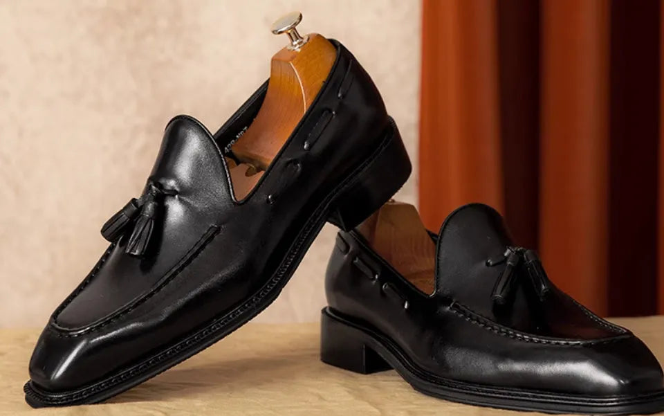 Men's black genuine leather loafers with fringed design and rubber soles