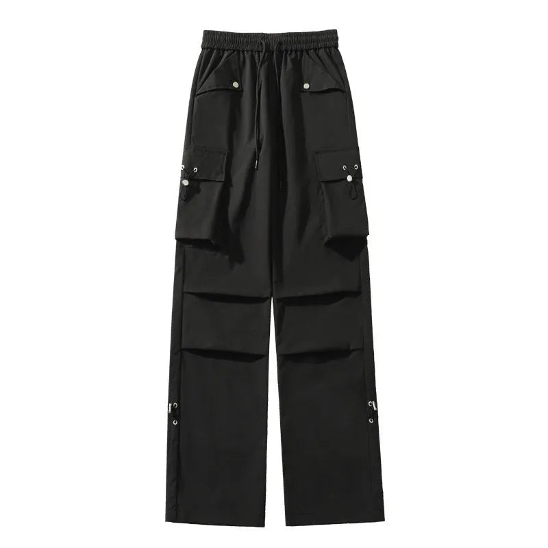 Women's plus size thin waterproof straight-leg trousers in black on a hanger, showing drawstring waist detail.