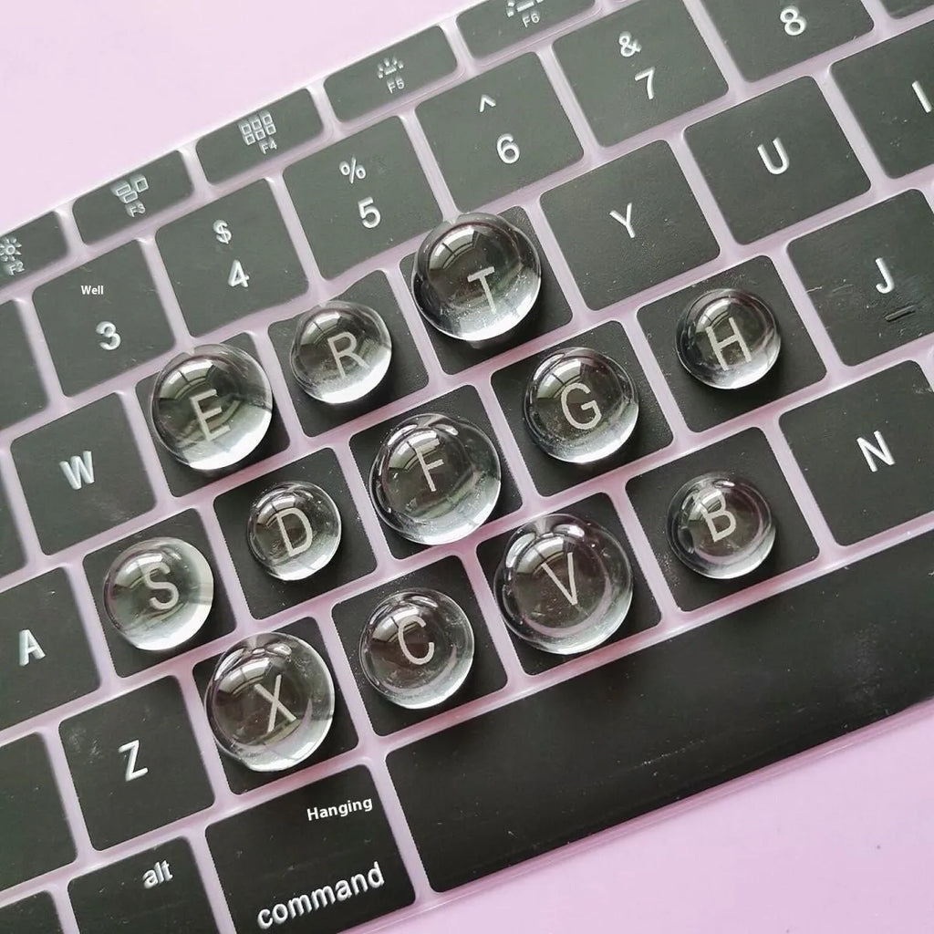 PVC crystal glass ball keyboard stickers in 12x6mm and 16x8mm sizes on a universal keyboard