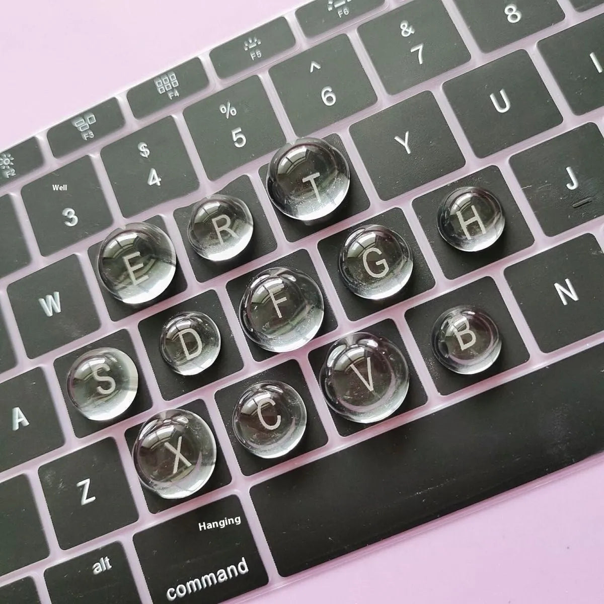 PVC crystal glass ball keyboard stickers in 12x6mm and 16x8mm sizes on a universal keyboard