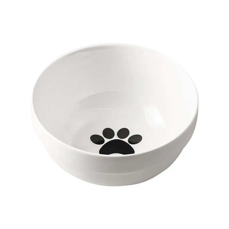 White ceramic cat bowl with decorative patterns on iron frame with cat ear details