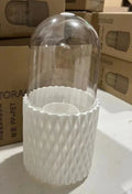 White rotating transparent acrylic makeup brush storage holder with dustproof lid on desktop