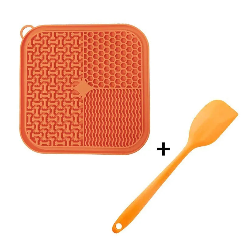 Blue silicone dog licking mat with textured pattern and suction cups on the back.