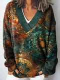 White women's V-neck long sleeve sweatshirt with a detailed 3D floral pattern print.