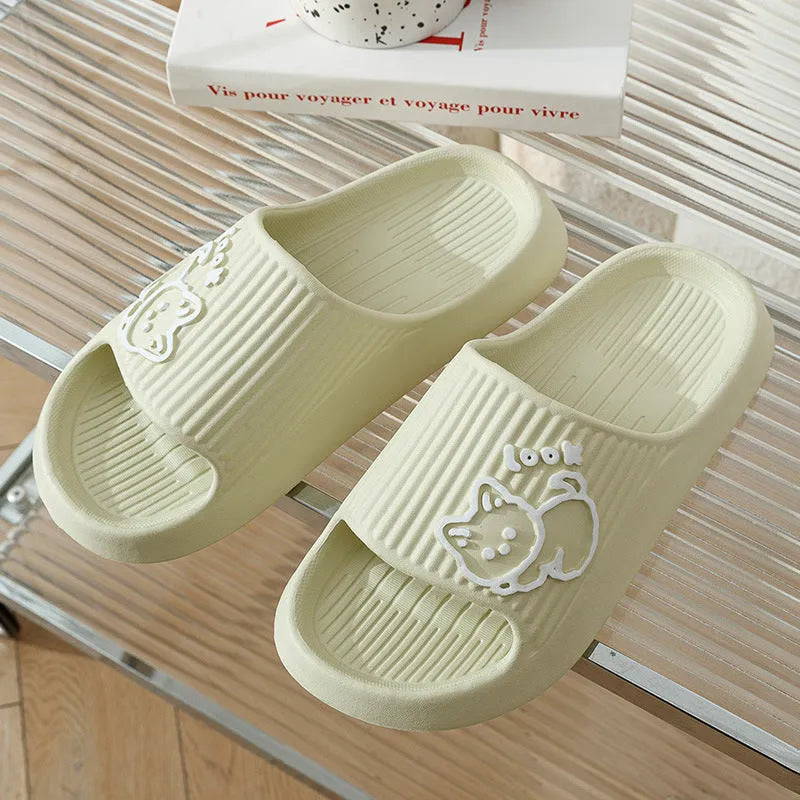 Women's green cat slippers with thick EVA platform sole, shown from above.
