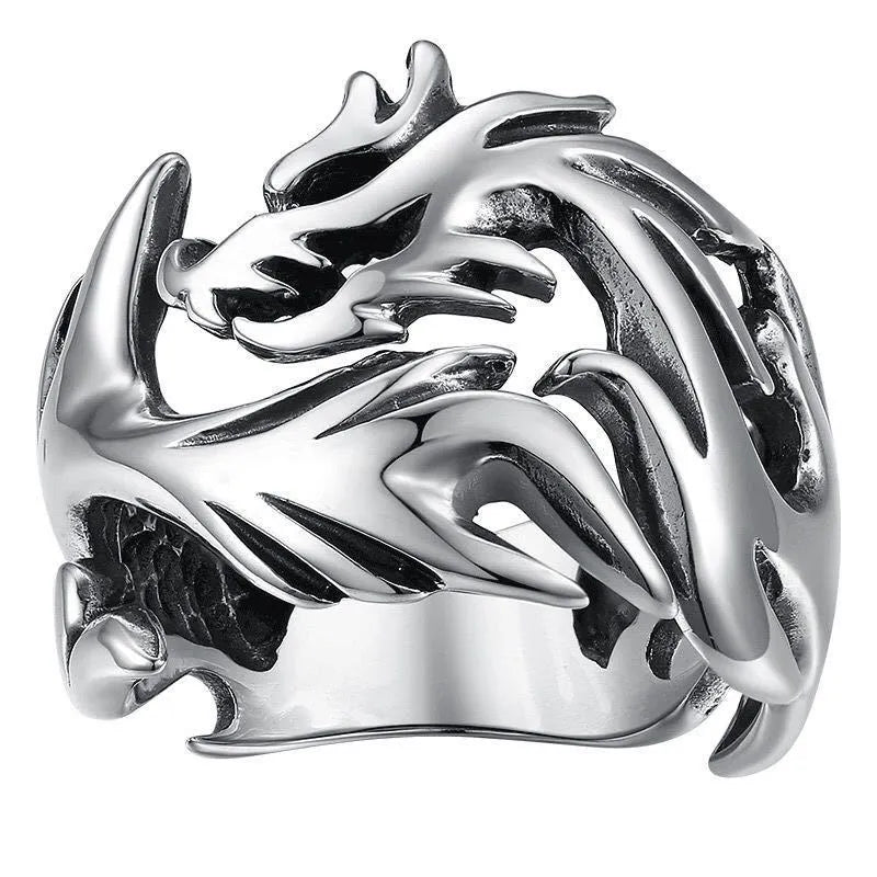 Close-up of an adjustable Chinese dragon pattern ring in antique silver, blue, and green colours.