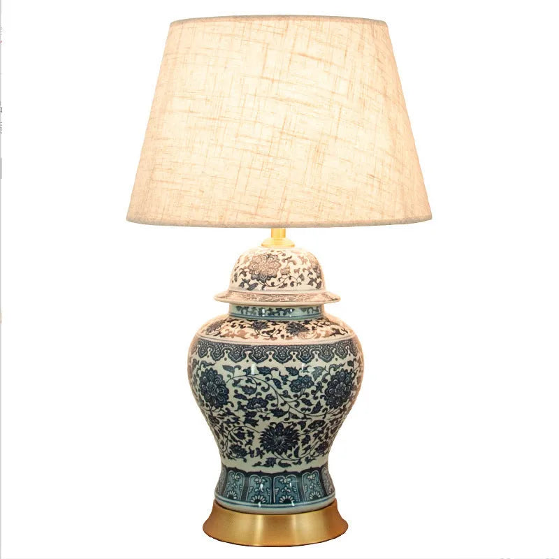 Chinese blue and white porcelain table lamp with handmade ceramic shade and cloth cover