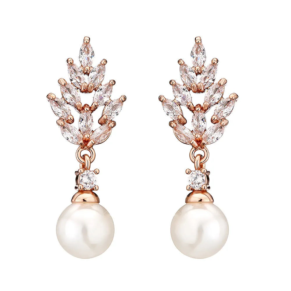 Geometric shaped floral earrings with micro zircon inlays, shown in a gold-tone plated finish.