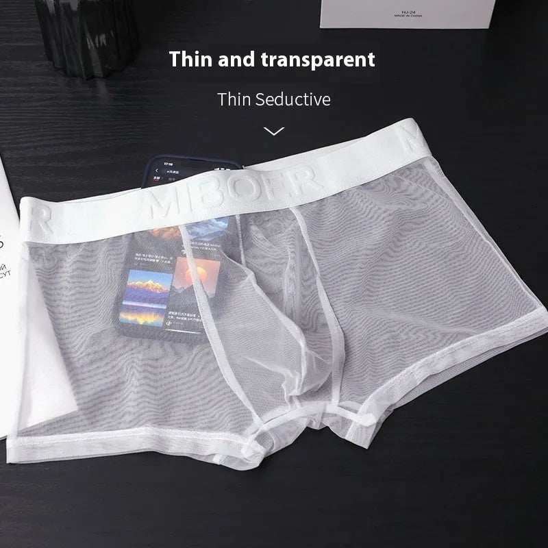 Men's thin polyester boxer shorts in multiple colours on a size chart showing Asian sizing.
