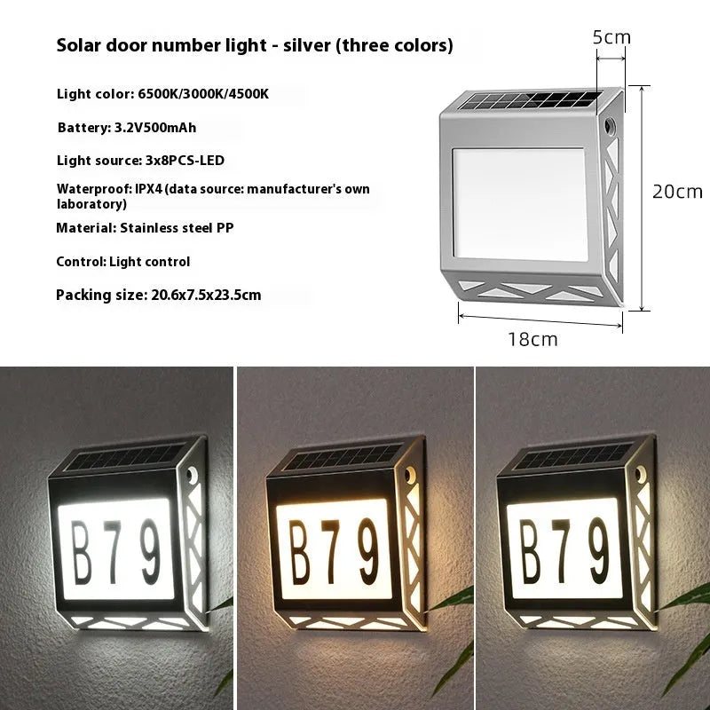 Solar powered doorplate light with LED indicator in black or silver finish, measuring 180x50x200mm