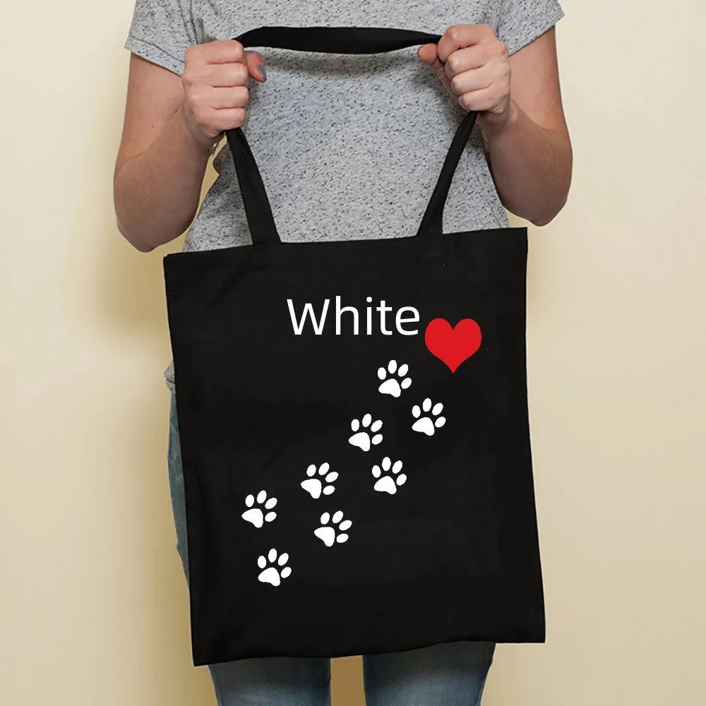 Sausage dog printed canvas bag in black with white dog design on front, sturdy tote for everyday use
