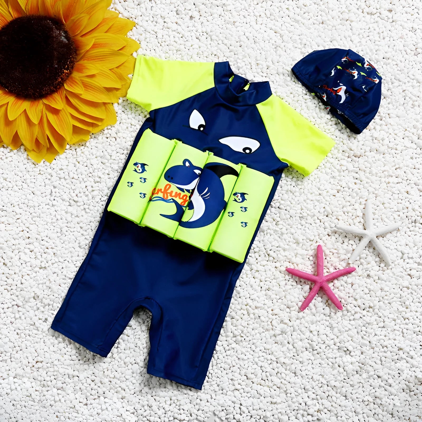 Buoyancy swimsuit with sun protection showing shark boy cartoon design on nylon fabric