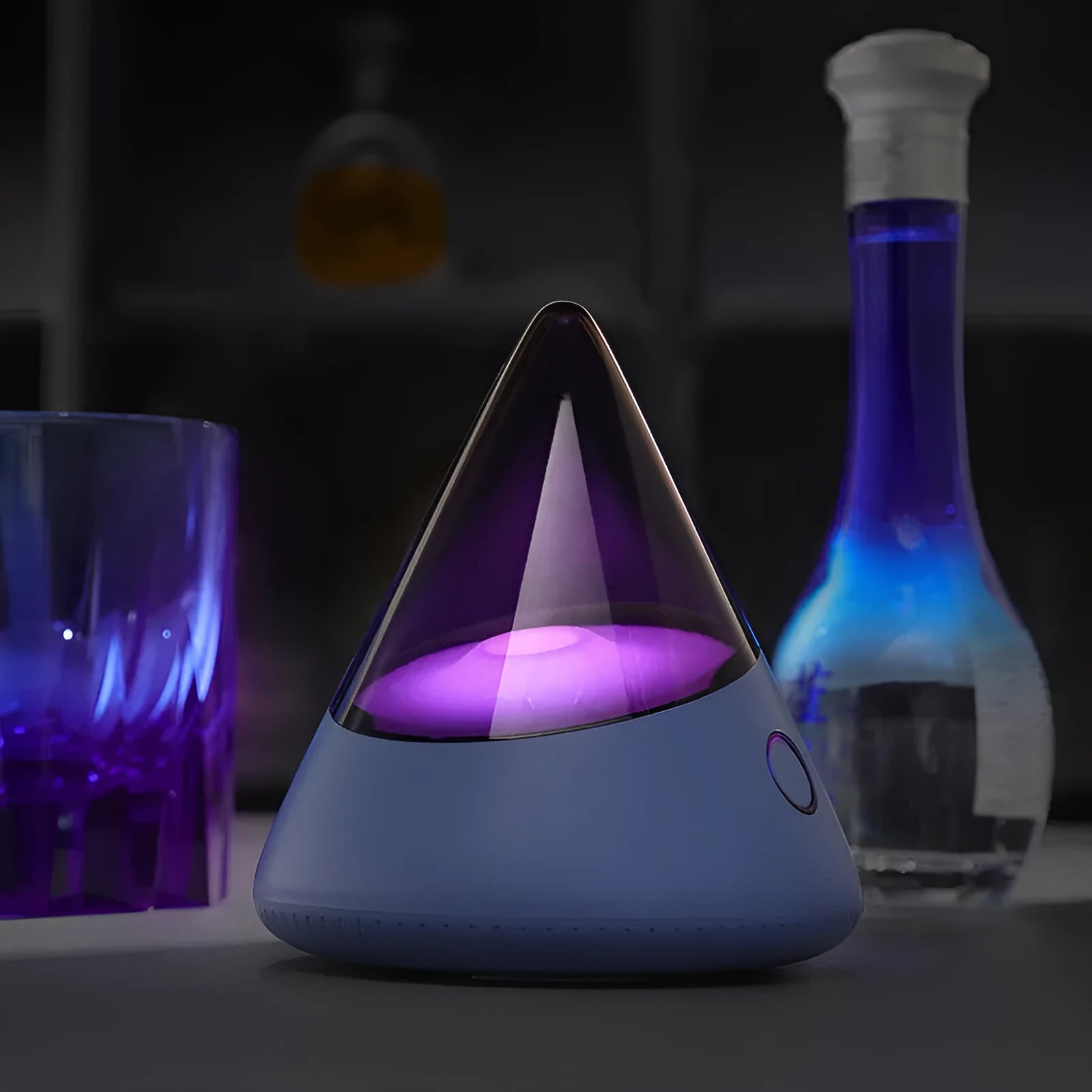 Colourful small geometric night lamp with built-in battery and Type-C charging cable on a wooden shelf