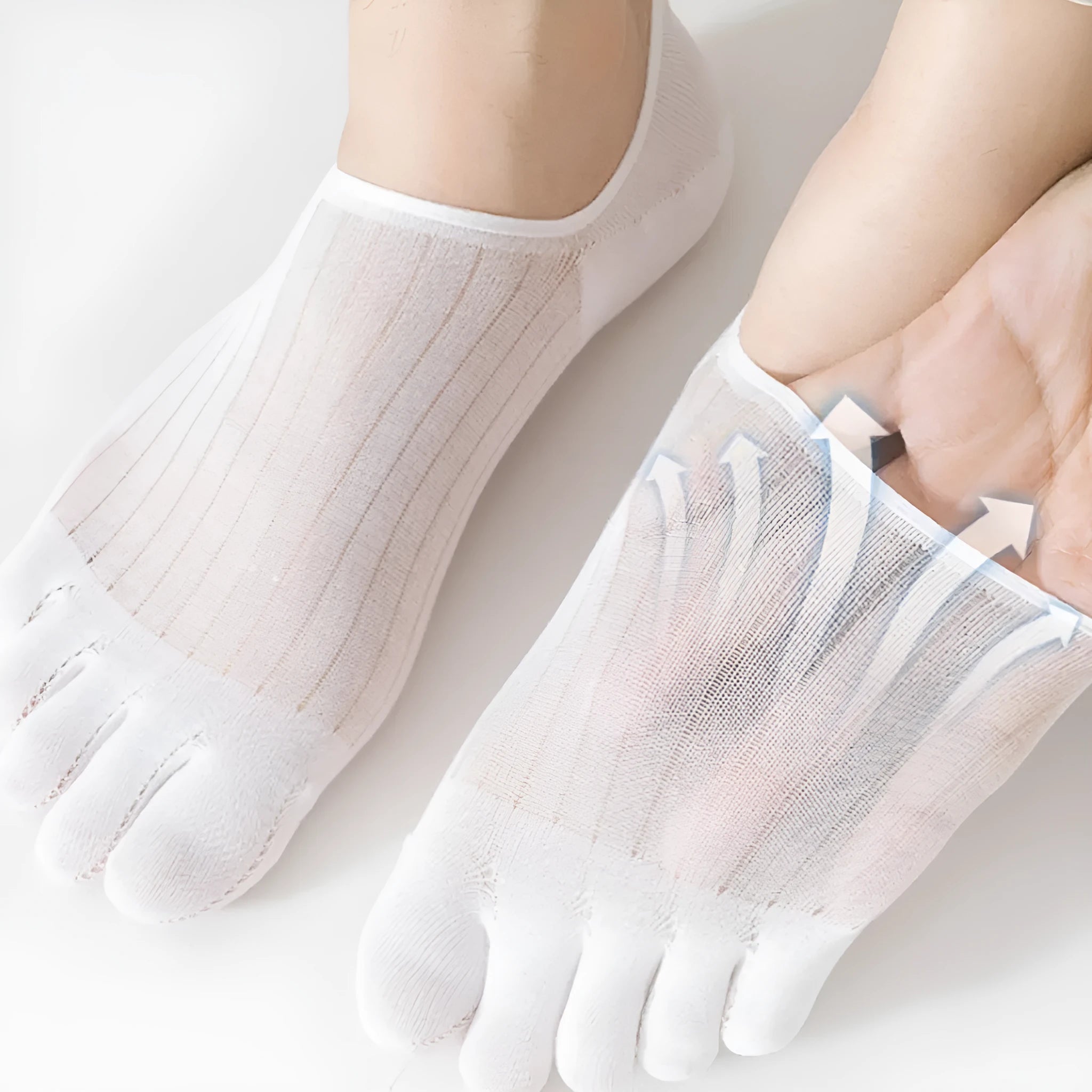 Modal five-finger boat socks in black, shown on a foot with invisible no-show style.