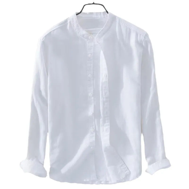 Man wearing a loose-fit light blue long sleeve cotton linen casual shirt.