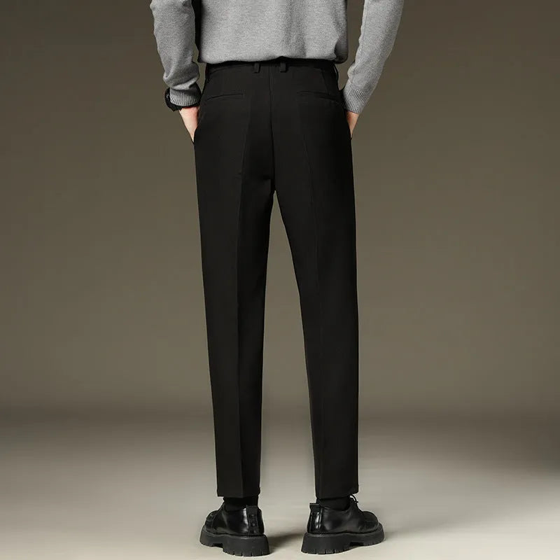 Men's black straight-leg fleece padded suit pants with wool lining, zipper fly, and mid-waist fit