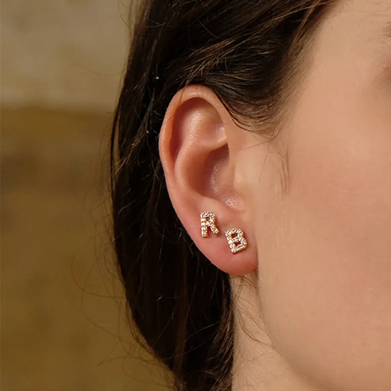 Brass gold plated English alphabet letter zircon earrings showing single letter design