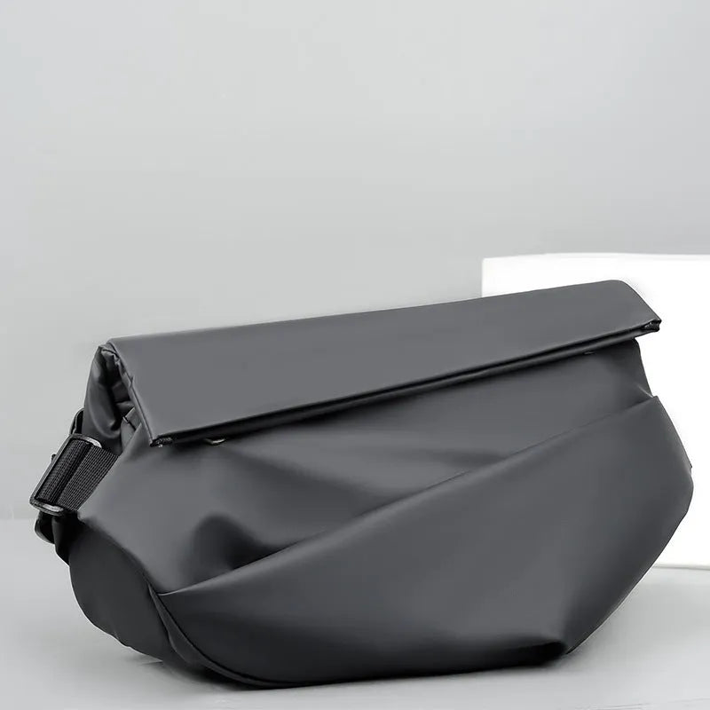 Men's grey medium crossbody sling bag showing internal phone and document compartments