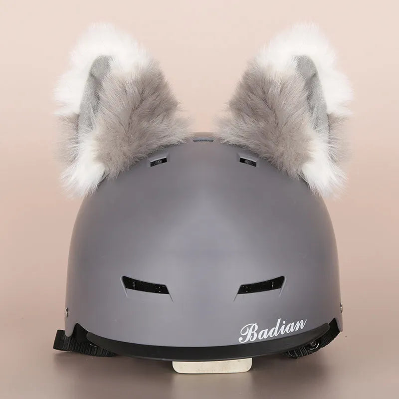 Cute plush cartoon animal character hat designed to decorate a standard ski helmet.