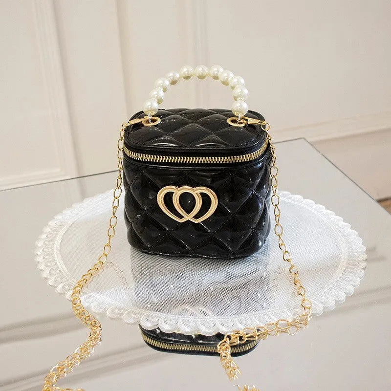 Transparent PVC bucket bag with a heart pattern, shown in one of seven available colours.