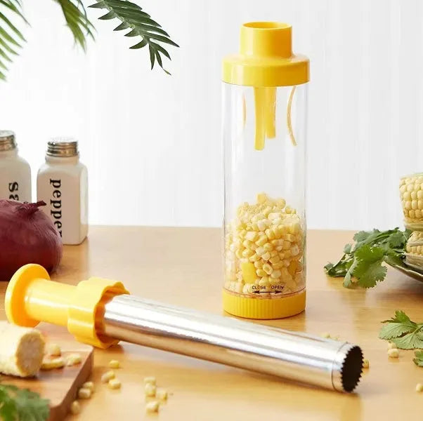Yellow cylindrical corn stripper kitchen tool made of ABS plastic and stainless steel.