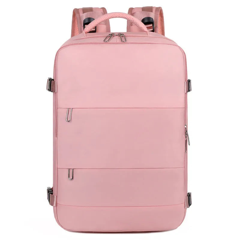 Large purple travel backpack for women with multiple compartments on a grey background.