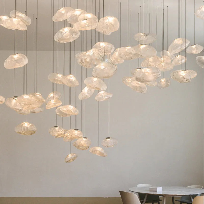 Modern fabric-style glass LED chandelier with clear, amber, or smoke grey shade, shown in small and large sizes.