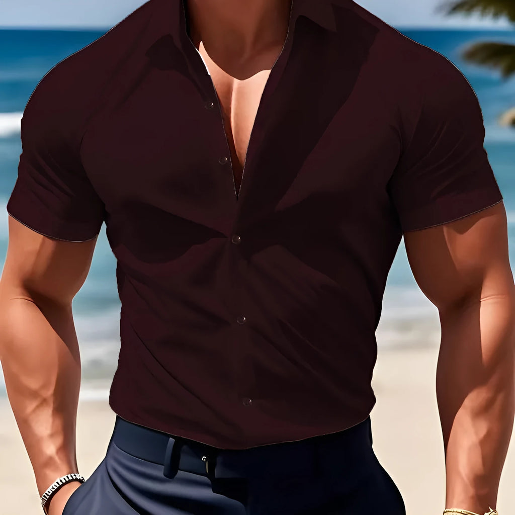 Men's brown short sleeve casual printed shirt with a collar on a hanger.