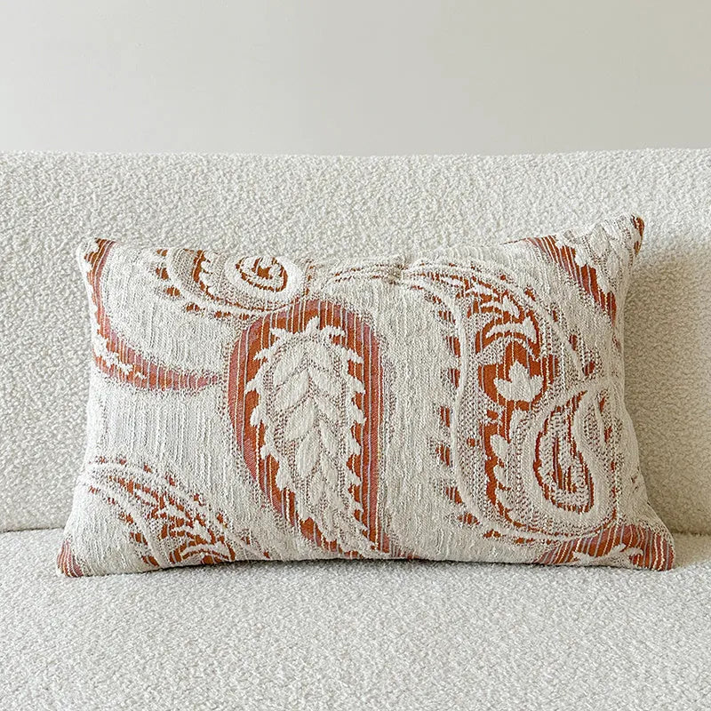 Amber jacquard paisley patterned sofa cushion cover with botanical floral design.