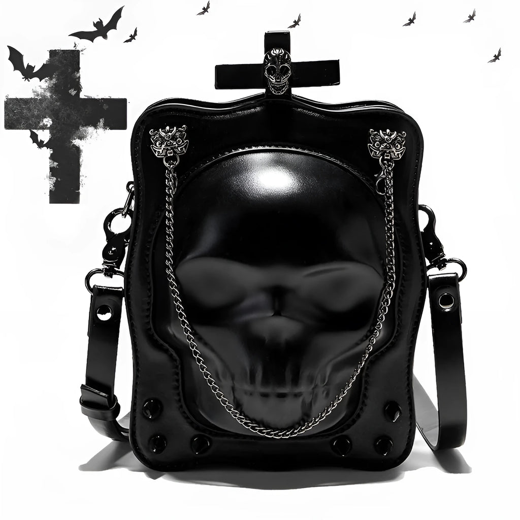 Black mini square messenger bag with embossed skull design, featuring stitching, rivets, chain details and zipper closure
