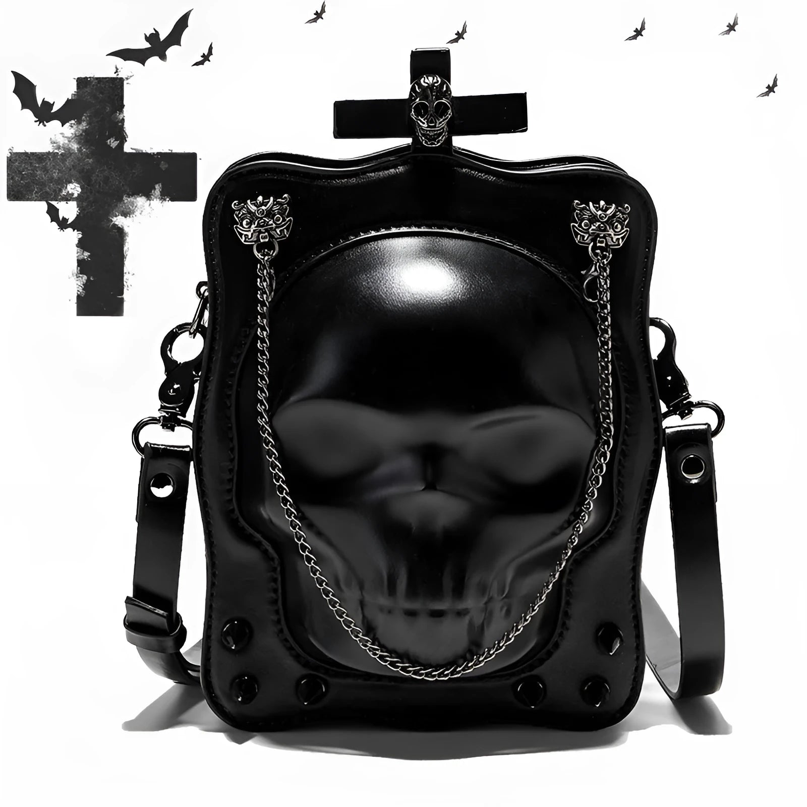 Black mini square messenger bag with embossed skull design, featuring stitching, rivets, chain details and zipper closure