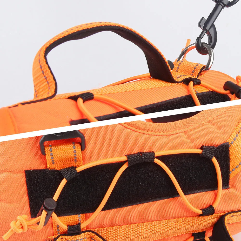 Orange reflective dog harness with black hand-holding rope shown on a dog.