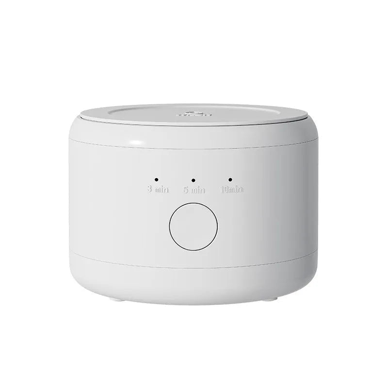 White ultrasonic tooth socket cleaning machine with 300ml tank, third gear timing, and 3-step thermostat on countertop